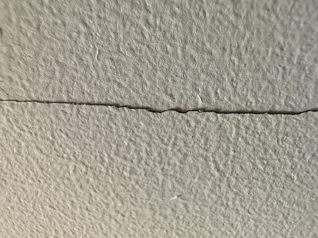 how to fix drywall seam cracks